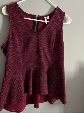 Elle Sleeveless Peplum Top in Deep Plum